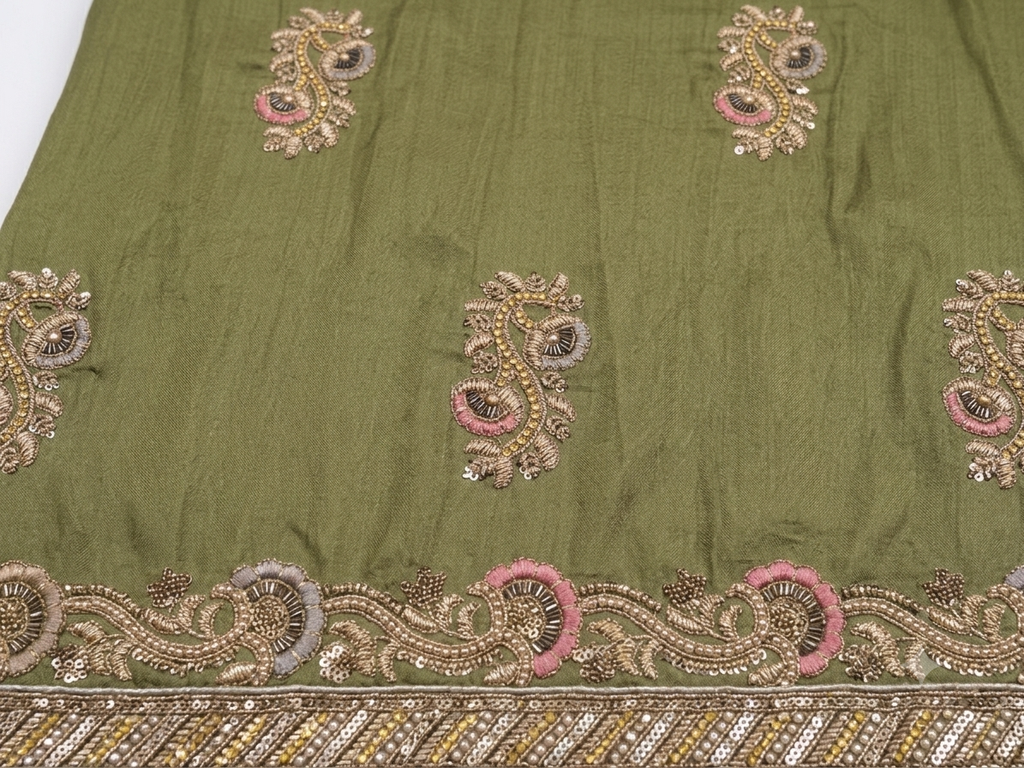 Olive green silk saree draped on model